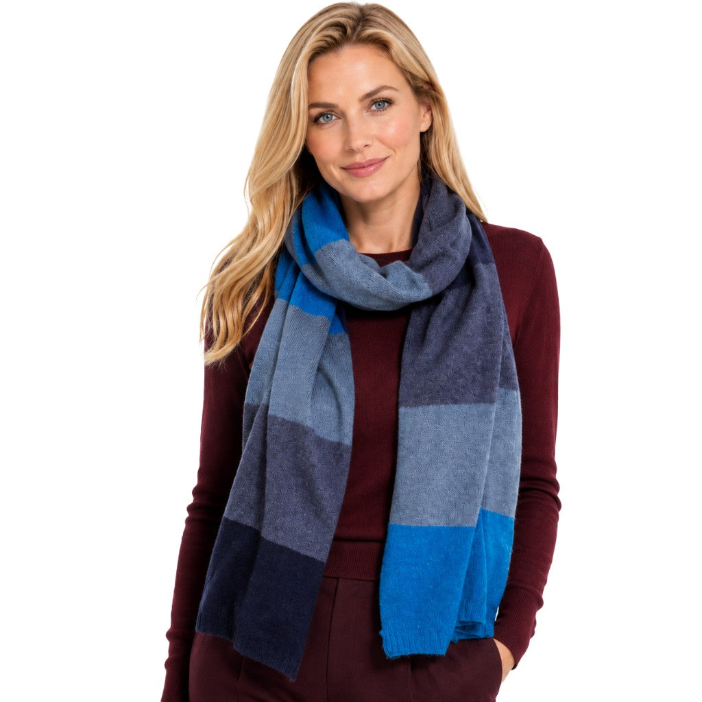 Blue Pacific Cashmere Knit Stripe Scarf in Denim, shown on model.